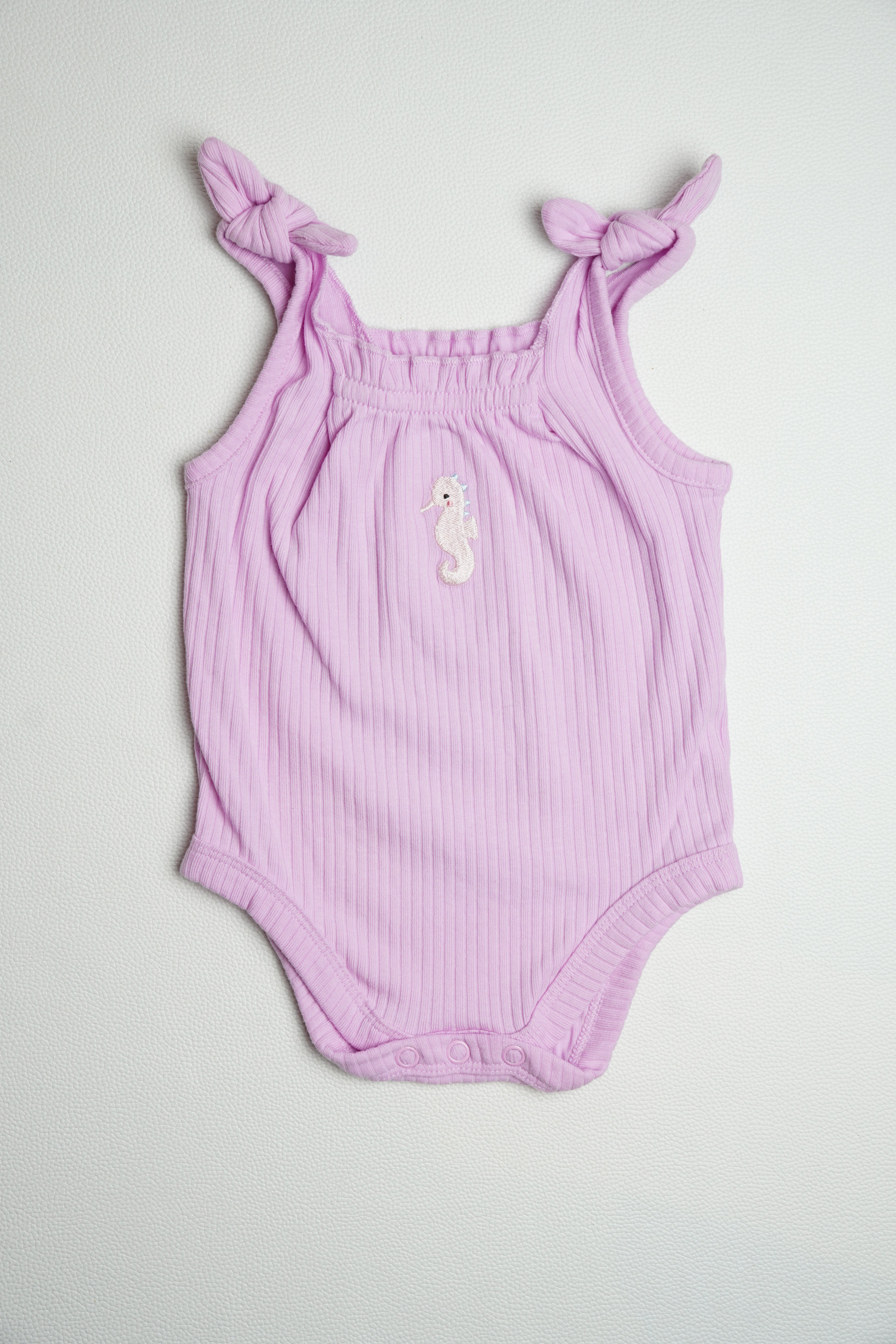 PURPLE SEA HORSE | ONESIE
