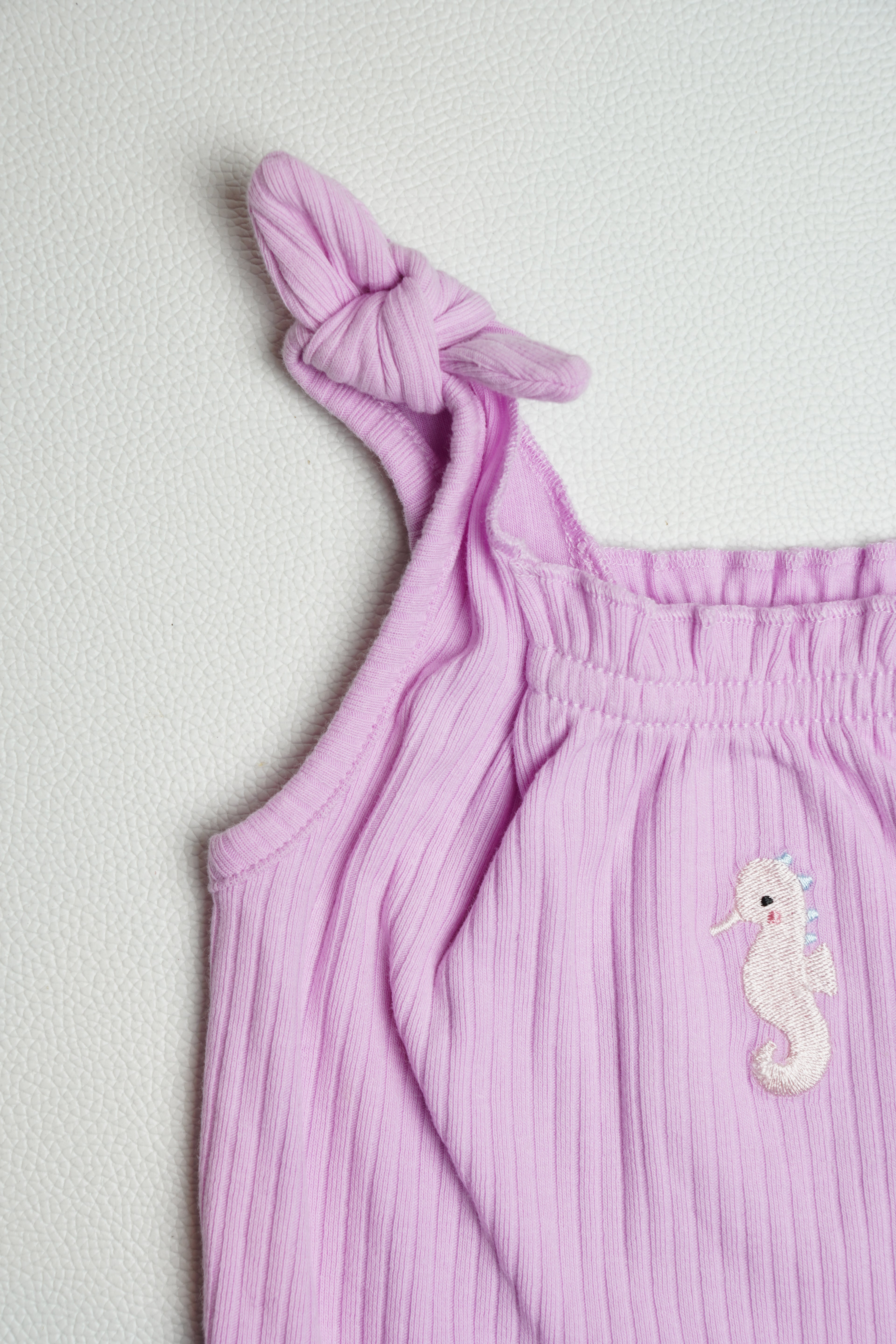PURPLE SEA HORSE | ONESIE